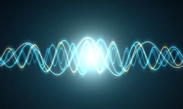 Layered glowing sound waves representing the personalised balancing audio